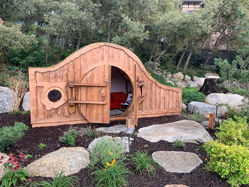 A one-of-a-kind and quite unique hobbit house was a fun surprise to find in the garden.